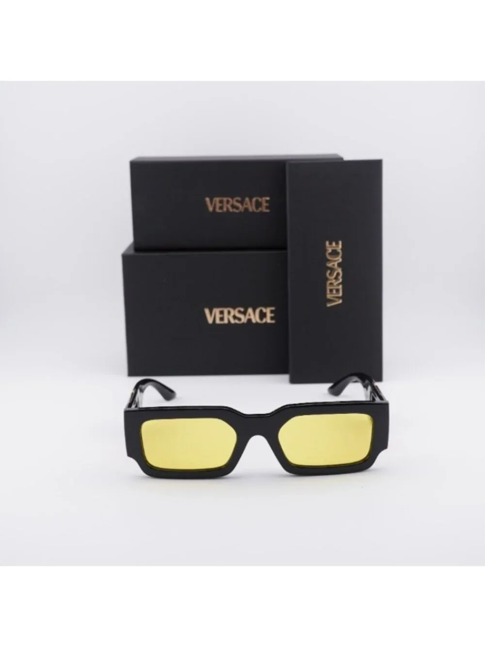 Versace VE4506U GB1/85 Sunglasses Black Rectangle Frame, Yellow Lenses